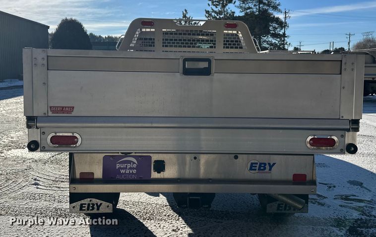 image for item DW4419 2022 RAM 3500 Crew Cab flatbed pickup truck