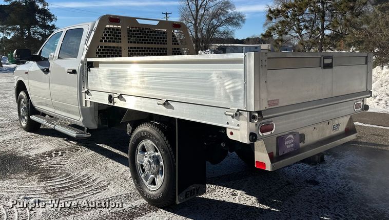 image for item DW4419 2022 RAM 3500 Crew Cab flatbed pickup truck