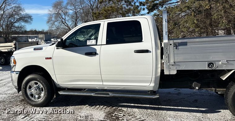 image for item DW4419 2022 RAM 3500 Crew Cab flatbed pickup truck