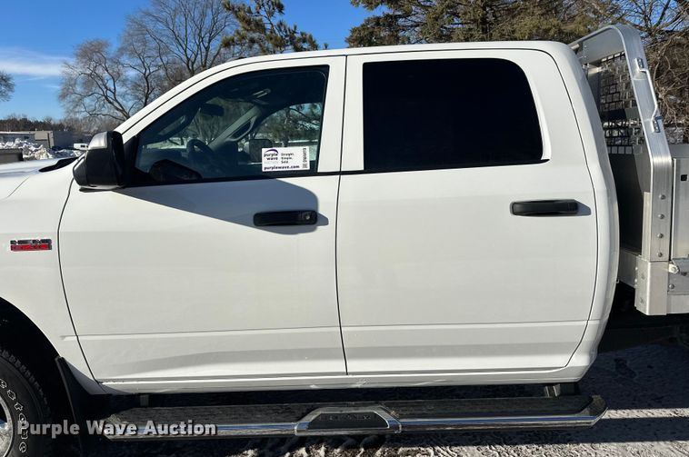 image for item DW4419 2022 RAM 3500 Crew Cab flatbed pickup truck