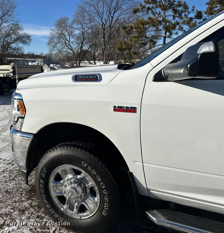 image for item DW4419 2022 RAM 3500 Crew Cab flatbed pickup truck