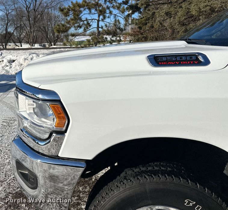 image for item DW4419 2022 RAM 3500 Crew Cab flatbed pickup truck