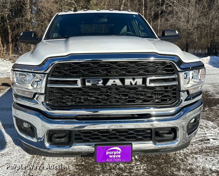 image for item DW4419 2022 RAM 3500 Crew Cab flatbed pickup truck