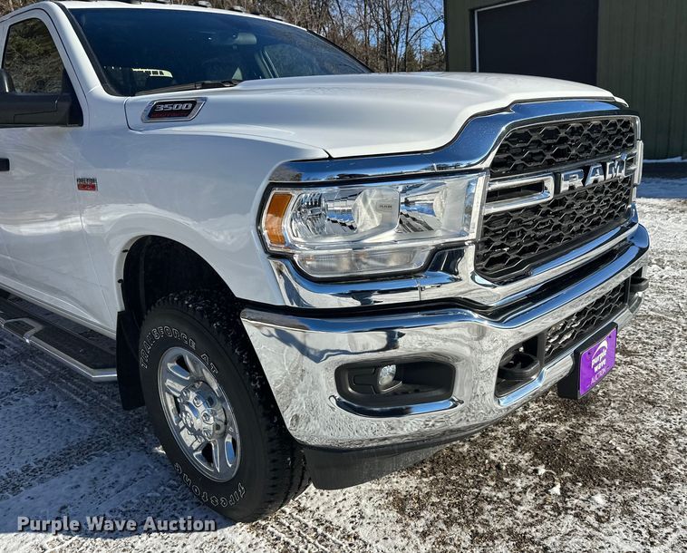 image for item DW4419 2022 RAM 3500 Crew Cab flatbed pickup truck