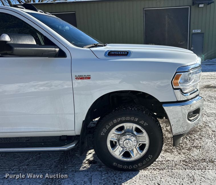 image for item DW4419 2022 RAM 3500 Crew Cab flatbed pickup truck