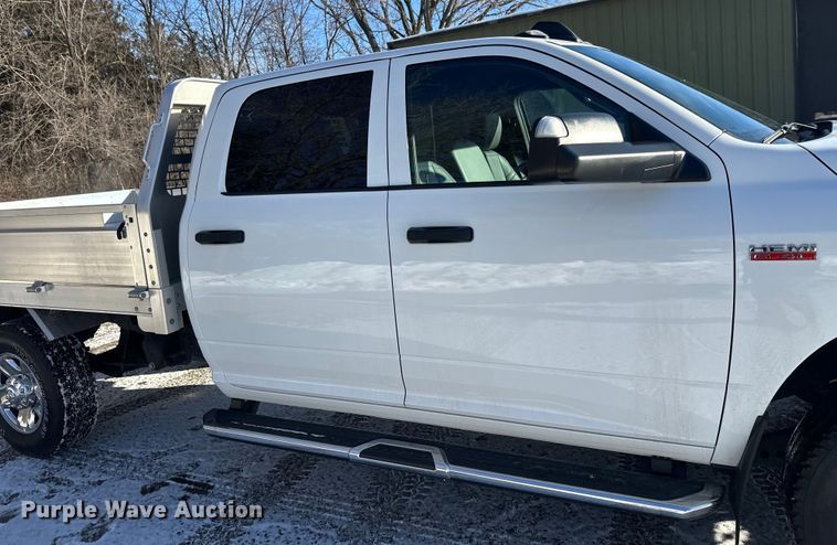 image for item DW4419 2022 RAM 3500 Crew Cab flatbed pickup truck