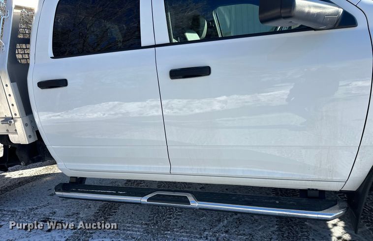 image for item DW4419 2022 RAM 3500 Crew Cab flatbed pickup truck