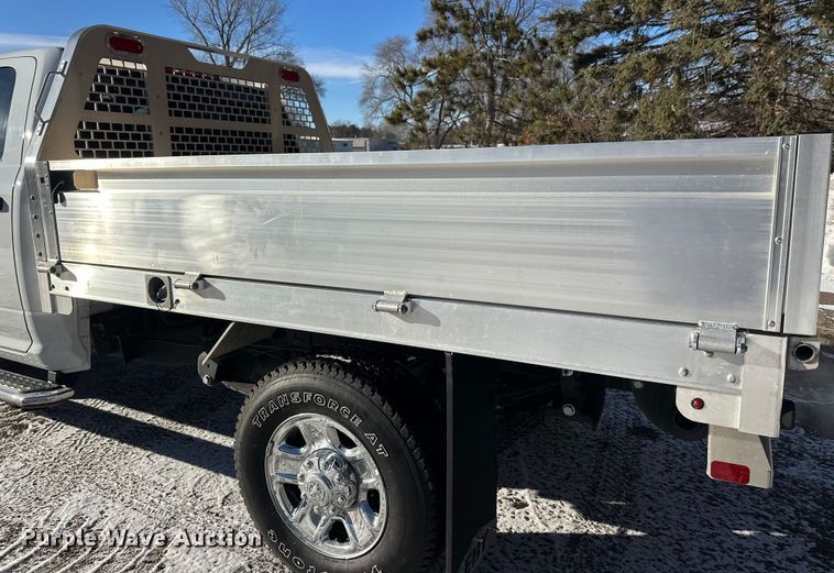image for item DW4419 2022 RAM 3500 Crew Cab flatbed pickup truck