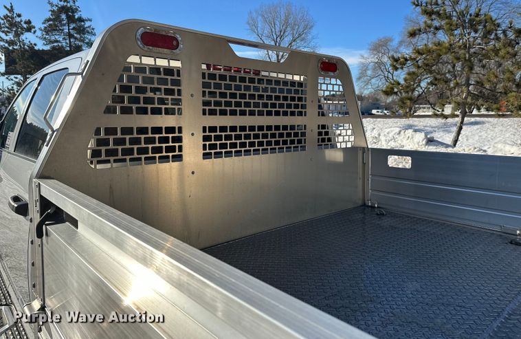 image for item DW4419 2022 RAM 3500 Crew Cab flatbed pickup truck