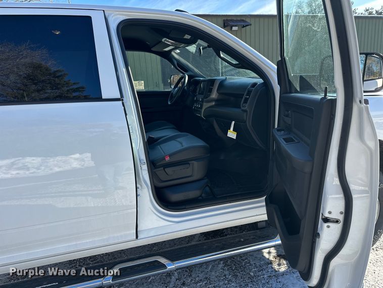 image for item DW4419 2022 RAM 3500 Crew Cab flatbed pickup truck