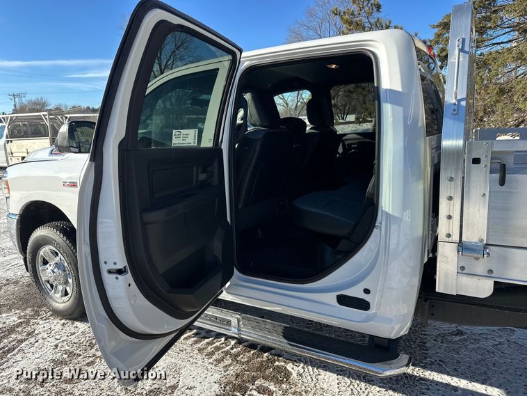 image for item DW4419 2022 RAM 3500 Crew Cab flatbed pickup truck