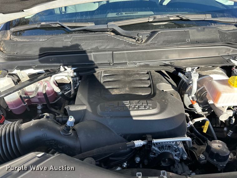 image for item DW4419 2022 RAM 3500 Crew Cab flatbed pickup truck