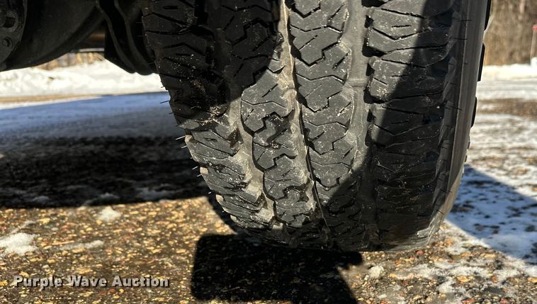 image for item DW4419 2022 RAM 3500 Crew Cab flatbed pickup truck