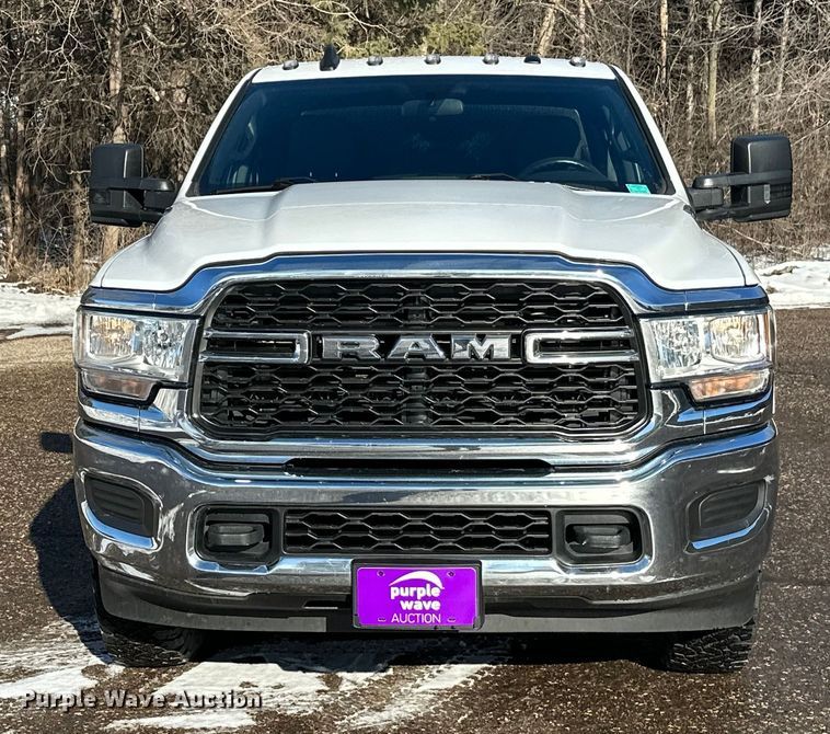 image for item DW4421 2022 RAM 3500 Crew Cab flatbed pickup truck