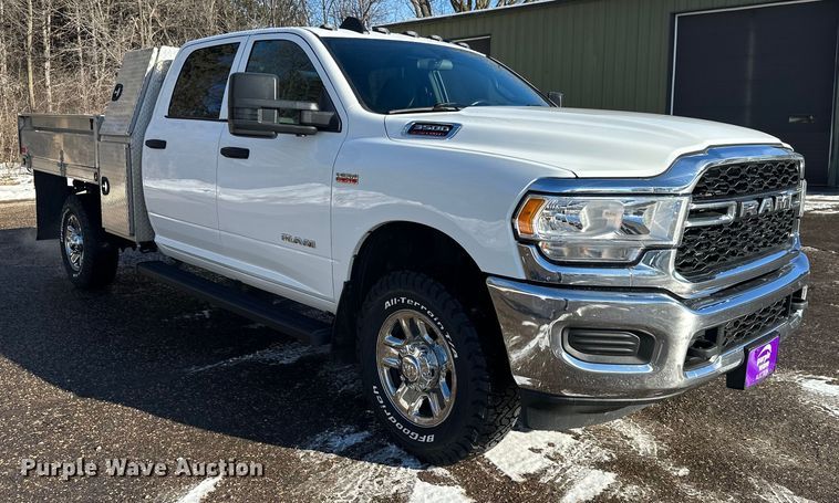 image for item DW4421 2022 RAM 3500 Crew Cab flatbed pickup truck