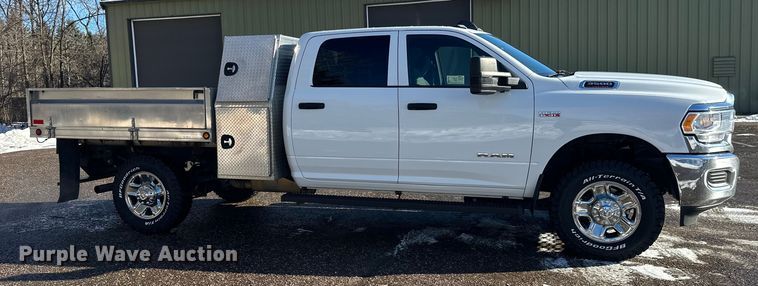 image for item DW4421 2022 RAM 3500 Crew Cab flatbed pickup truck