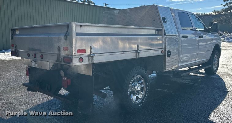 image for item DW4421 2022 RAM 3500 Crew Cab flatbed pickup truck