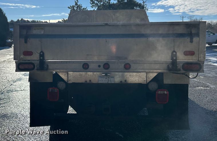 image for item DW4421 2022 RAM 3500 Crew Cab flatbed pickup truck