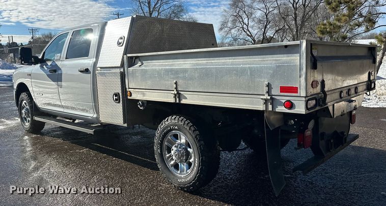image for item DW4421 2022 RAM 3500 Crew Cab flatbed pickup truck