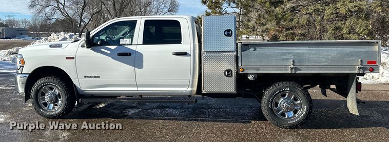 image for item DW4421 2022 RAM 3500 Crew Cab flatbed pickup truck