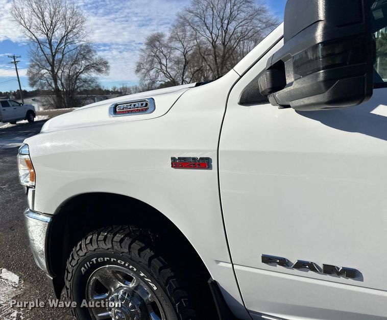 image for item DW4421 2022 RAM 3500 Crew Cab flatbed pickup truck