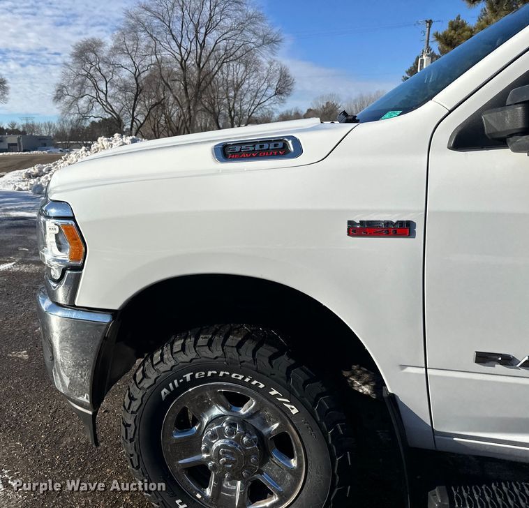 image for item DW4421 2022 RAM 3500 Crew Cab flatbed pickup truck