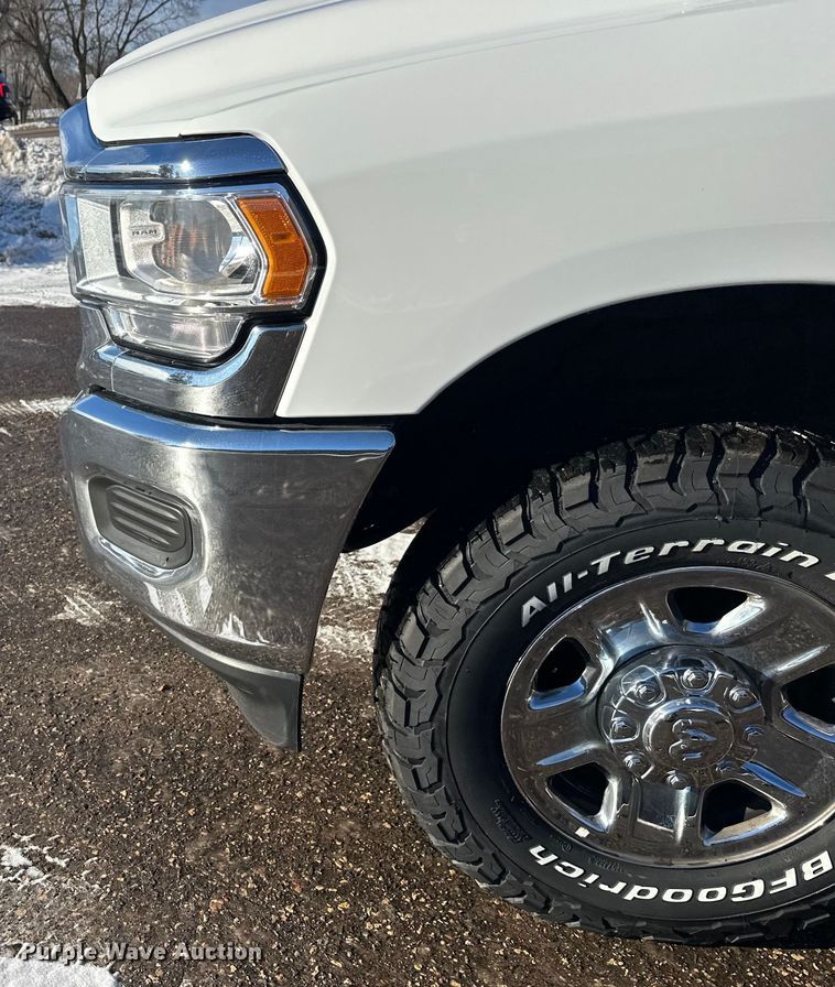 image for item DW4421 2022 RAM 3500 Crew Cab flatbed pickup truck