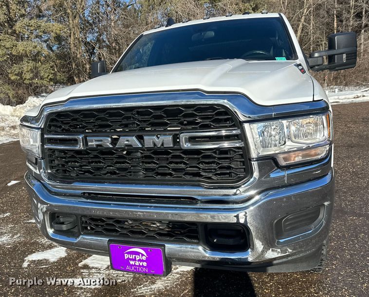 image for item DW4421 2022 RAM 3500 Crew Cab flatbed pickup truck