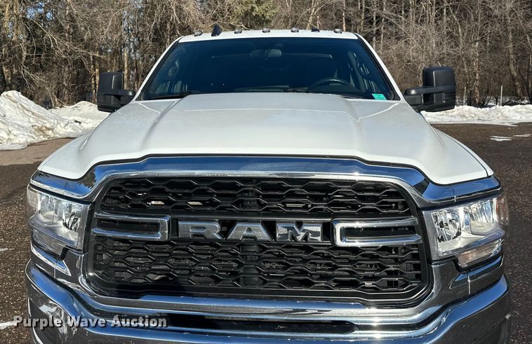 image for item DW4421 2022 RAM 3500 Crew Cab flatbed pickup truck