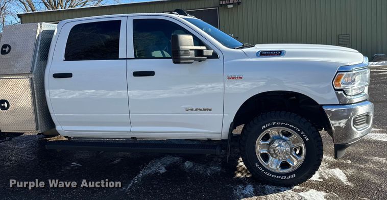 image for item DW4421 2022 RAM 3500 Crew Cab flatbed pickup truck