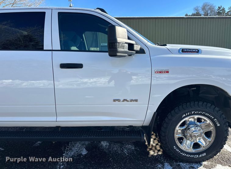 image for item DW4421 2022 RAM 3500 Crew Cab flatbed pickup truck