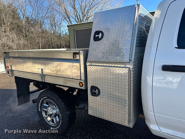 image for item DW4421 2022 RAM 3500 Crew Cab flatbed pickup truck