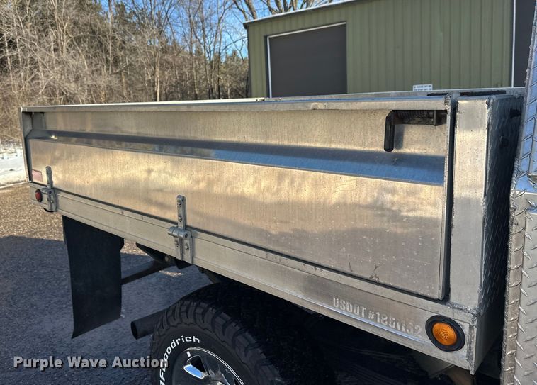 image for item DW4421 2022 RAM 3500 Crew Cab flatbed pickup truck