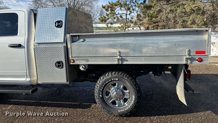 image for item DW4421 2022 RAM 3500 Crew Cab flatbed pickup truck