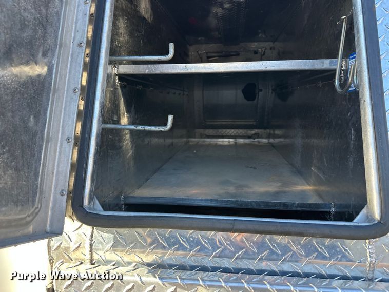 image for item DW4421 2022 RAM 3500 Crew Cab flatbed pickup truck