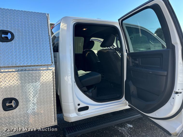 image for item DW4421 2022 RAM 3500 Crew Cab flatbed pickup truck