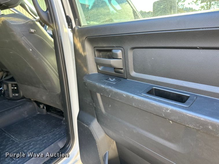 image for item DW4421 2022 RAM 3500 Crew Cab flatbed pickup truck