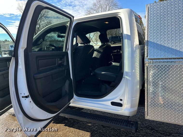 image for item DW4421 2022 RAM 3500 Crew Cab flatbed pickup truck