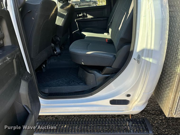 image for item DW4421 2022 RAM 3500 Crew Cab flatbed pickup truck