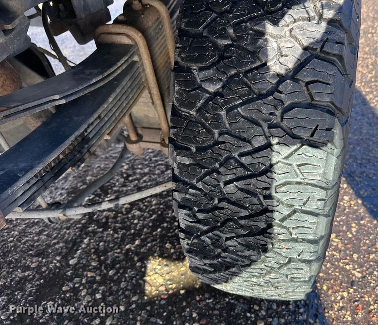 image for item DW4421 2022 RAM 3500 Crew Cab flatbed pickup truck