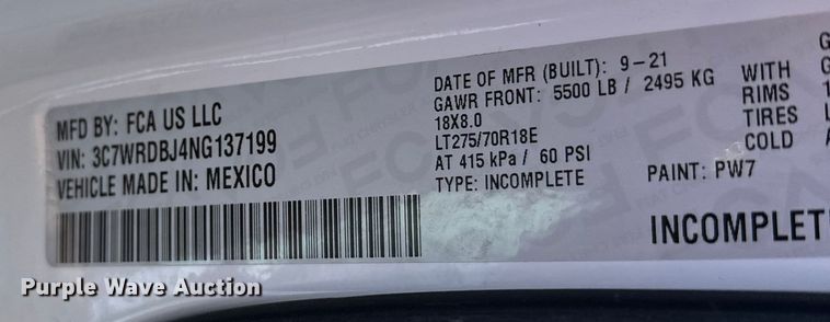 image for item DW4421 2022 RAM 3500 Crew Cab flatbed pickup truck