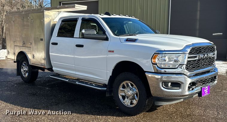image for item DW4422 2022 RAM 3500 Crew Cab utility bed pickup truck