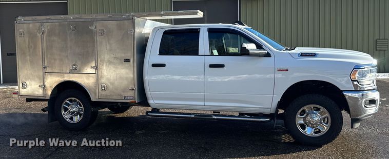 image for item DW4422 2022 RAM 3500 Crew Cab utility bed pickup truck