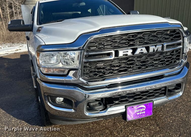 image for item DW4422 2022 RAM 3500 Crew Cab utility bed pickup truck