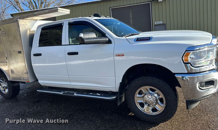 image for item DW4422 2022 RAM 3500 Crew Cab utility bed pickup truck