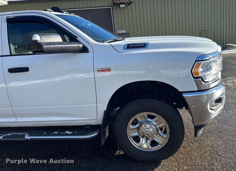 image for item DW4422 2022 RAM 3500 Crew Cab utility bed pickup truck