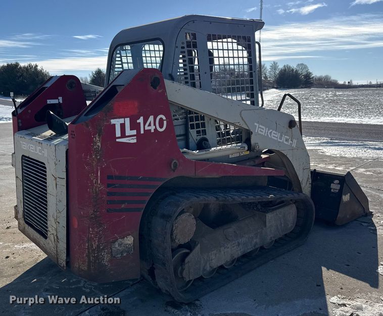 MINI CARGADOR SOBRE RUEDAS 2006 TAKEUCHI TL140
