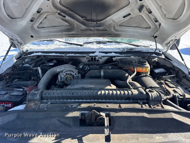 image for item ER0397 2005 Ford F450 Super Duty XL Crew Cab flatbed pickup truck