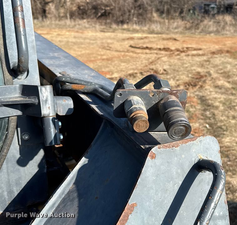 image for item ES5769 2013 John Deere 323DT tracked skid steer loader