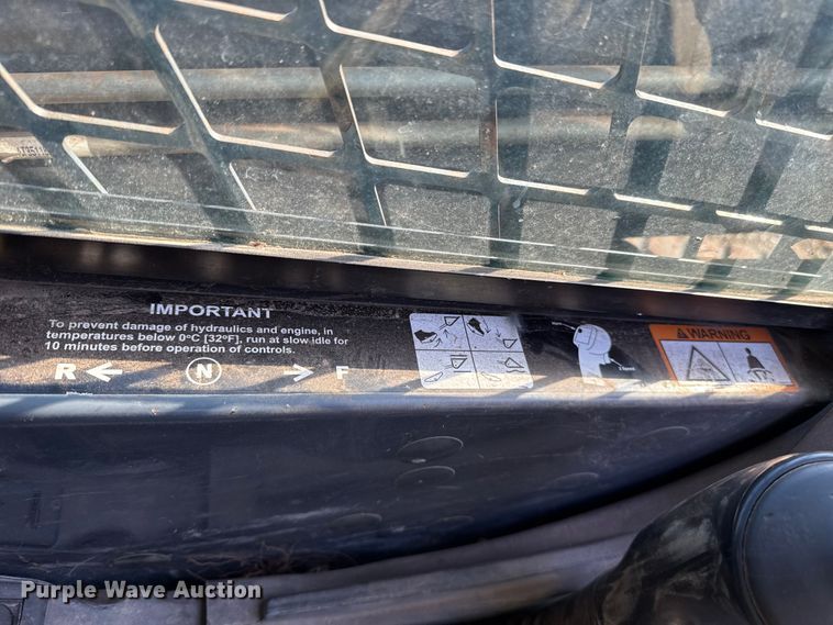 image for item ES5769 2013 John Deere 323DT tracked skid steer loader